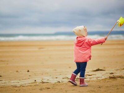 Weather Patterns with Little Girl on Windy Day